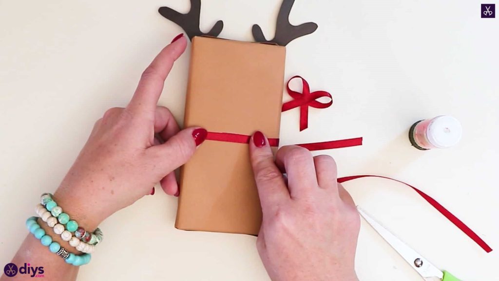 Emballage de cadeau de renne pour le dos de Noël