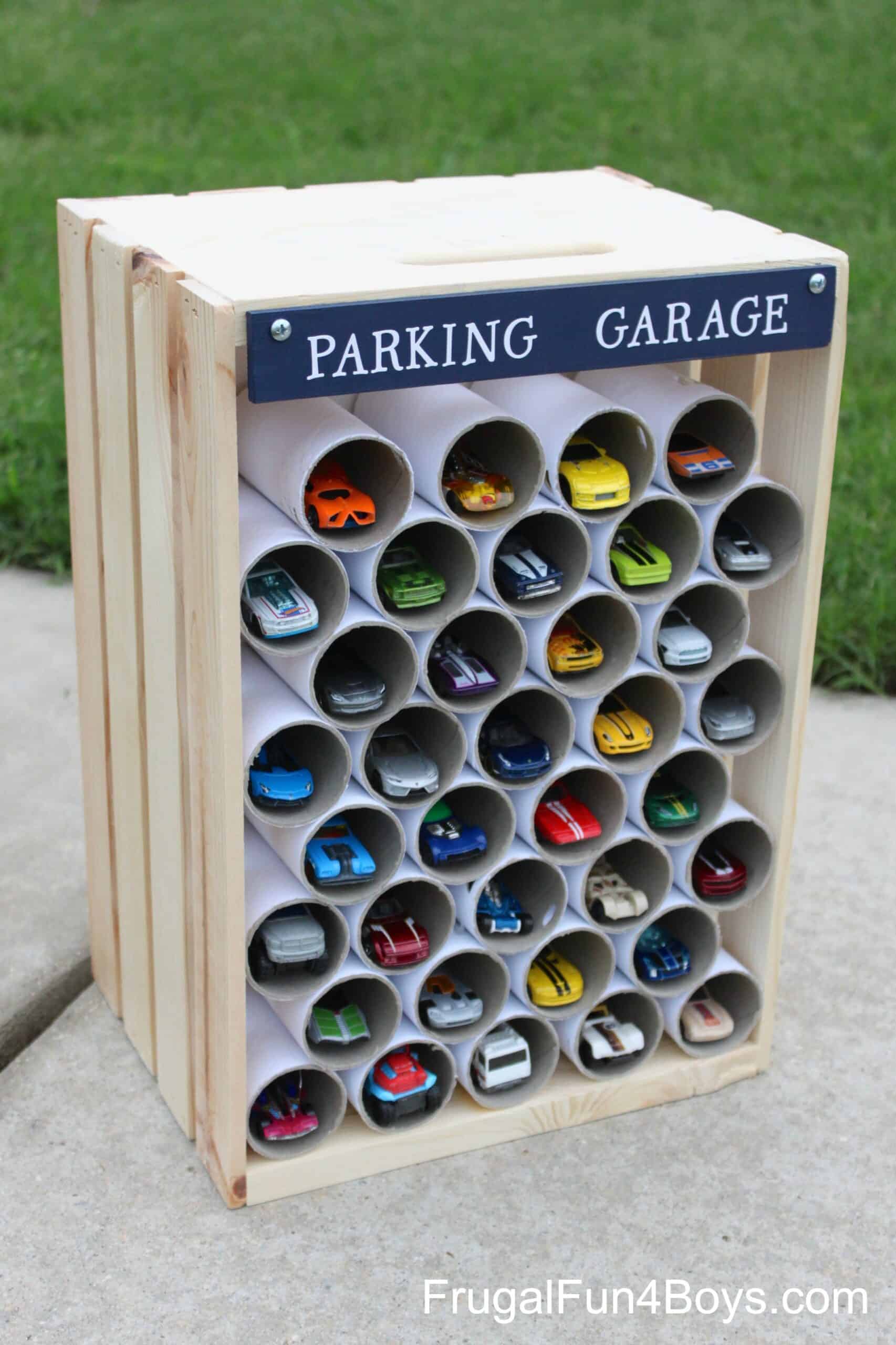 Wooden crate and cardboard pipe toy car parking garage