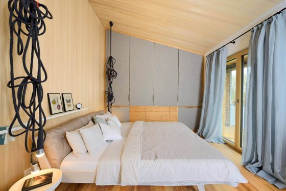 Conception de chambre avec murs et plafonds en bois