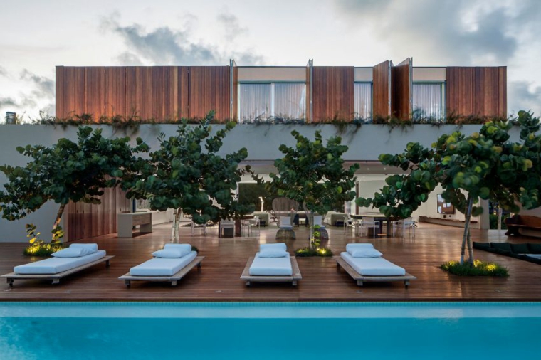 maison de plage brésil design chaises longues arbres idées de jardin