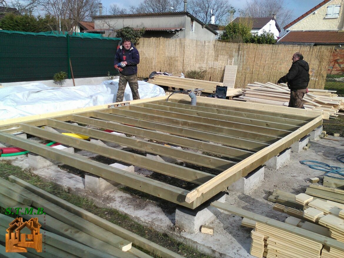 Comment poser des dalles sur de la terre ?