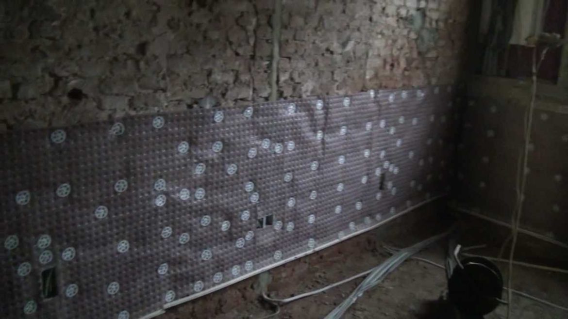 Quel sont les solutions pour cacher un mur humide ?